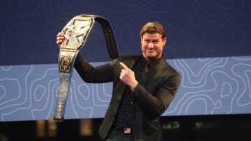 NEW YORK, NEW YORK - NOVEMBER 11: Dolph Ziggler poses with auctioned wrestling event item during Team Rubicon's Veterans Day Salute To Service Gala at Spring Studios on November 11, 2021 in New York City. (Photo by Astrid Stawiarz/Getty Images)