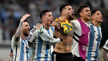 Enzo Fernandez and Paulo Dybala of Argentina (Photo by MANAN VATSYAYANA/AFP via Getty Images)