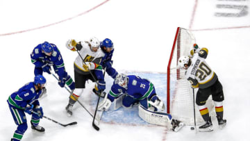 Jacob Markstrom #25 of the Vancouver Canucks stops a shot against Chandler Stephenson #20 of the Vegas Golden Knights during the first period in Game Three of the Western Conference Second Round. (Photo by Bruce Bennett/Getty Images)