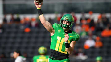 The return of fifth-year former Auburn football quarterback Bo Nix makes Oregon an NFL draft deadline winner according to 247Sports' Chris Hummer Mandatory Credit: The Register Guard