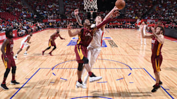 LAS VEGAS, NV - JULY 14: Brayon Blake #77 of the Cleveland Cavaliers and Isaiah Hartenstein #55 of the Houston Rockets go for a rebound during the 2018 Las Vegas Summer League on July 14, 2018 at the Thomas & Mack Center in Las Vegas, Nevada. NOTE TO USER: User expressly acknowledges and agrees that, by downloading and/or using this photograph, user is consenting to the terms and conditions of the Getty Images License Agreement. Mandatory Copyright Notice: Copyright 2018 NBAE (Photo by Garrett Ellwood/NBAE via Getty Images)