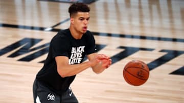 LAKE BUENA VISTA, FLORIDA - AUGUST 03: Michael Porter Jr. #1 of the Denver Nuggets warms up before a game against the Oklahoma City Thunder at The Arena at ESPN Wide World Of Sports Complex on August 3, 2020 in Lake Buena Vista, Florida. NOTE TO USER: User expressly acknowledges and agrees that, by downloading and or using this photograph, User is consenting to the terms and conditions of the Getty Images License Agreement. (Photo by Kim Klement-Pool/Getty Images)