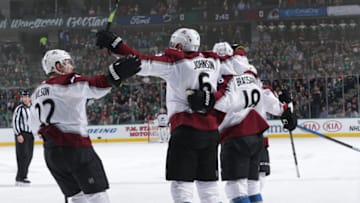 DALLAS, TX - MARCH 21: Colin Wilson #22, Erik Johnson #6, Derick Brassard #18 and the Colorado Avalanche celebrate a goal against the Dallas Stars at the American Airlines Center on March 21, 2019 in Dallas, Texas. (Photo by Glenn James/NHLI via Getty Images)