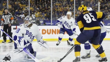 NASHVILLE, TENNESSEE - FEBRUARY 26: Andrei Vasilevskiy #88 of the Tampa Bay Lightning looks for the puck after being shot by Matt Duchene #95 of the Nashville Predators in the second period during the 2022 Navy Federal Credit Union NHL Stadium Series between the Tampa Bay Lightning and the Nashville Predators at Nissan Stadium on February 26, 2022 in Nashville, Tennessee. (Photo by Frederick Breedon/Getty Images)