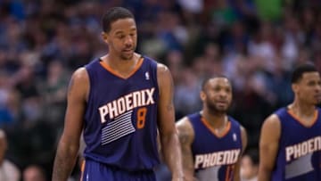 Apr 12, 2014; Dallas, TX, USA; Phoenix Suns forward Channing Frye (8) reacts to his team missing a shot against the Dallas Mavericks during the second half at the American Airlines Center. The Mavericks defeated the Suns 101-98 and clinched a spot in the NBA playoffs. Mandatory Credit: Jerome Miron-USA TODAY Sports