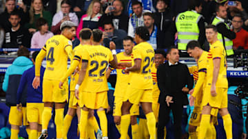 BARCELONA, SPAIN - MAY 14: Alex Balde of FC Barcelona celebrates after scoring the team's second goal with teammates during the LaLiga Santander match between RCD Espanyol and FC Barcelona at RCDE Stadium on May 14, 2023 in Barcelona, Spain. (Photo by Eric Alonso/Getty Images)