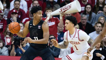 Jan 22, 2023; Bloomington, Indiana, USA; Michigan State Spartans guard A.J. Hoggard (11) dribbles the ball while Indiana Hoosiers guard Jalen Hood-Schifino (1) defends in the first half at Simon Skjodt Assembly Hall. Mandatory Credit: Trevor Ruszkowski-USA TODAY Sports