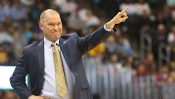 Jan 23, 2016; Denver, CO, USA; Denver Nuggets head coach Michael Malone provides direction during the first half against the Detroit Pistons at Pepsi Center. Mandatory Credit: Chris Humphreys-USA TODAY Sports