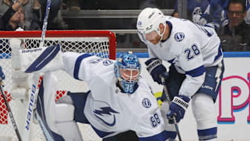 TORONTO, CANADA - DECEMBER 20: Andrei Vasilevskiy #88 of the Tampa Bay Lightning covers the puck against the Toronto Maple Leafs during the third period of an NHL game at Scotiabank Arena on December 20, 2022 in Toronto, Ontario, Canada. The Maple Leafs defeated the Lightning 4-1. (Photo by Claus Andersen/Getty Images)