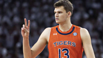 FAYETTEVILLE, ARKANSAS - FEBRUARY 08: Walker Kessler #13 of the Auburn Tigers signals to the bench during a game against the Arkansas Razorbacks at Bud Walton Arena on February 08, 2022 in Fayetteville, Arkansas. The Razorbacks defeated the Tigers 80-76. (Photo by Wesley Hitt/Getty Images)