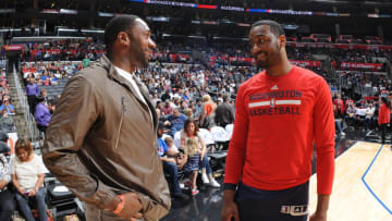 LOS ANGELES, CA - APRIL 3: John Wall #2 of the Washington Wizards talks with former NBA player, Gilbert Arenas before the game against the Los Angeles Clippers on April 3, 2016 at STAPLES Center in Los Angeles, California. NOTE TO USER: User expressly acknowledges and agrees that, by downloading and/or using this Photograph, user is consenting to the terms and conditions of the Getty Images License Agreement. Mandatory Copyright Notice: Copyright 2016 NBAE (Photo by Andrew D. Bernstein/NBAE via Getty Images)