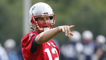 Jun 7, 2016; Foxborough, MA, USA; New England Patriots quarterback Tom Brady (12) directs receivers during mini camp at Gillette Stadium. Mandatory Credit: Winslow Townson-USA TODAY Sports