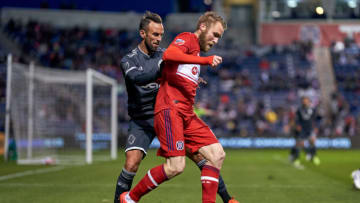 CHICAGO, IL - APRIL 12: Chicago Fire forward Aleksandar Katai (10) battles with Vancouver Whitecaps midfielder Scott Sutter (23) in action during a game between the Chicago Fire and the Vancouver Whitecaps on April 12, 2019 at SeatGeek Stadium in Bridgeview, IL. (Photo by Robin Alam/Icon Sportswire via Getty Images)