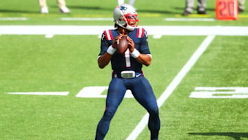 FOXBOROUGH, MASSACHUSETTS - SEPTEMBER 27: Cam Newton #1 of the New England Patriots looks to pass during a game against the Las Vegas Raiders at Gillette Stadium on September 27, 2020 in Foxborough, Massachusetts. (Photo by Adam Glanzman/Getty Images)