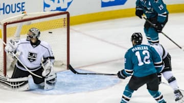Apr 20, 2016; San Jose, CA, USA; San Jose Sharks left wing Patrick Marleau (12) shoots and scores against Los Angeles Kings goalie Jonathan Quick (32) in the third period of game four of the first round of the 2016 Stanley Cup Playoffs at SAP Center at San Jose. The Sharks won 3-2. Mandatory Credit: John Hefti-USA TODAY Sports