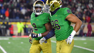 SOUTH BEND, IN - NOVEMBER 10: Notre Dame Fighting Irish running back Dexter Williams (2) celebrates with Notre Dame Fighting Irish tight end Alize Mack (86) after scoring a touchdown in action during the first quarter of a football game between the Notre Dame Fighting Irish and the Florida State Seminoles on November 10, 2018 at Notre Dame Stadium in South Bend, Indiana. (Photo by Robin Alam/Icon Sportswire via Getty Images)