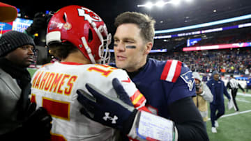 FOXBOROUGH, MASSACHUSETTS - DECEMBER 08: Tom Brady #12 of the New England Patriots talks with Patrick Mahomes #15 of the Kansas City Chiefs after the Chief defeat the Patriots 23-16 at Gillette Stadium on December 08, 2019 in Foxborough, Massachusetts. (Photo by Maddie Meyer/Getty Images)