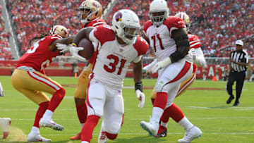 SANTA CLARA, CA - OCTOBER 07: David Johnson #31 of the Arizona Cardinals carries the ball against the San Francisco 49ers during the second quarter of their NFL football game at Levi's Stadium on October 7, 2018 in Santa Clara, California. (Photo by Thearon W. Henderson/Getty Images)