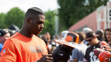 Jul 31, 2016; Berea, OH, USA; Cleveland Browns wide receiver Josh Gordon signs autographs for fans following practice at the Cleveland Browns Training Facility in Berea, OH. Mandatory Credit: Scott R. Galvin-USA TODAY Sports
