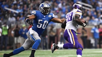 Oct 25, 2015; Detroit, MI, USA; Minnesota Vikings running back Adrian Peterson (28) runs the ball past Detroit Lions outside linebacker Travis Lewis (50) during the game at Ford Field. Mandatory Credit: Tim Fuller-USA TODAY Sports