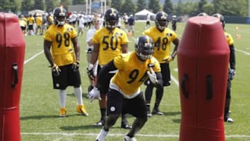 Jun 17, 2014; Pittsburgh, PA, USA; Pittsburgh Steelers linebacker Lawrence Timmons (94) participates in drills during minicamp at the UPMC Sports Performance Complex. Mandatory Credit: Charles LeClaire-USA TODAY Sports