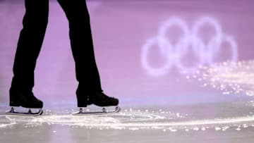 GANGNEUNG, SOUTH KOREA - FEBRUARY 09: The Olympic Rings are seen in the ice as Junhwan Cha of Korea competes in the Figure Skating Team Event - Men's Single Skating Short Program during the PyeongChang 2018 Winter Olympic Games at Gangneung Ice Arena on February 9, 2018 in Gangneung, South Korea. (Photo by Robert Cianflone/Getty Images)