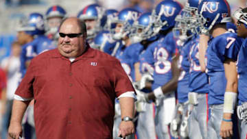LAWRENCE, KS - SEPTEMBER 19: Head coach Mark Mangino of the Kansas Jayhawks walk on the field before the game against the Duke Blue Devils on Kivisto Field at Memorial Stadium on September 19, 2009 in Lawrence, Kansas. (Photo by Jamie Squire/Getty Images)