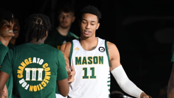 FAIRFAX, VA - FEBRUARY 24: Jordan Miller #11 of the George Mason Patriots is introduced before a college basketball game against the George Washington Colonials at Eagle Bank Arena on February 24, 2021 in Fairfax, Virginia. (Photo by Mitchell Layton/Getty Images)