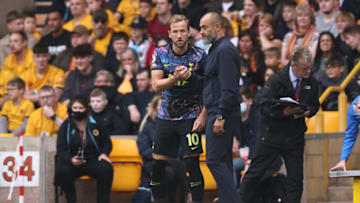 WOLVERHAMPTON, ENGLAND - AUGUST 22: Harry Kane of Tottenham Hotspur with Nuno Espírito Santo manager of Tottenham Hotspur during the Premier League match between Wolverhampton Wanderers and Tottenham Hotspur at Molineux on August 22, 2021 in Wolverhampton, England. (Photo by Marc Atkins/Getty Images)