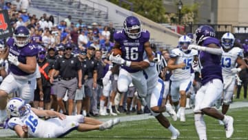 Sep 11, 2021; Evanston, Illinois, USA; Northwestern Wildcats safety Brandon Joseph (16) runs back a punt against the Indiana State Sycamores during the second half at Ryan Field. Mandatory Credit: David Banks-USA TODAY Sports