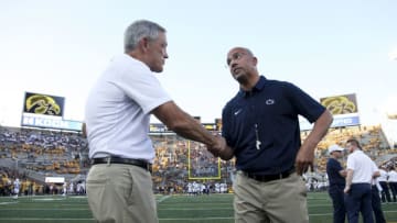 IOWA CITY, IOWA- SEPTEMBER 23: Head coach James Franklin of the Penn State Nittany Lions visits with head coach Kirk Ferentz of the Iowa Hawkeyes before their match-up on September 23, 2017 at Kinnick Stadium in Iowa City, Iowa. (Photo by Matthew Holst/Getty Images)