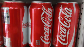 CHICAGO, IL - APRIL 17: Cans of Coca-Cola soda are offered for sale at a grocery store on April 17, 2012 in Chicago, Illinois. The Coca-Cola Co. reported an 8 percent increase in net income for the first quarter of 2012 with global volume growth of 5%. (Photo by Scott Olson/Getty Images)