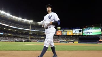 Sep 24, 2013; Bronx, NY, USA; New York Yankees third baseman Alex Rodriguez walks back to the dugout after flying out to end the fourth inning against the Tampa Bay Rays at Yankee Stadium. Mandatory Credit: John Munson/THE STAR-LEDGER via USA TODAY Sports