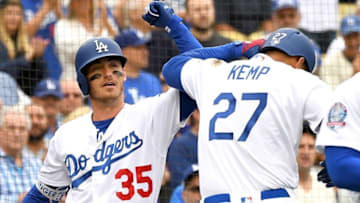 LOS ANGELES, CA - JUNE 16: Matt Kemp #27 is greeted by Cody Bellinger #35 of the Los Angeles Dodgers after hitting a solo home run in the first inning of the game against the San Francisco Giants at Dodger Stadium on June 16, 2018 in Los Angeles, California. (Photo by Jayne Kamin-Oncea/Getty Images)