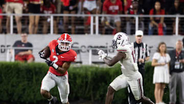 Kendall Milton outruns Jaylan Foster during the South Carolina game. (Photo by Steven Limentani/ISI Photos/Getty Images)