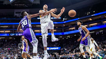 Sacramento Kings forward Harry Giles (20) strips the ball from the Utah Jazz center Rudy Gobert (27) on Sunday, Nov. 25, 2018 at the Golden 1 Center in Sacramento, Calif. (Hector Amezcua/Sacramento Bee/TNS via Getty Images)