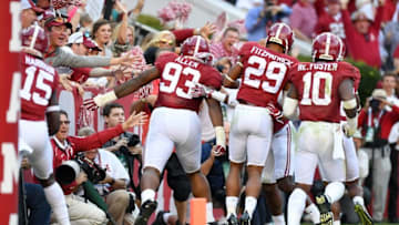 Oct 22, 2016; Tuscaloosa, AL, USA; Alabama Crimson Tide defensive lineman Jonathan Allen (93) celebrates his returned fumble for a touchdown against the Texas A&M Aggies during the third quarter at Bryant-Denny Stadium. Mandatory Credit: John David Mercer-USA TODAY Sports