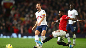 MANCHESTER, ENGLAND - DECEMBER 04: Harry Kane of Tottenham Hotspur battles for possession with Fred of Manchester United during the Premier League match between Manchester United and Tottenham Hotspur at Old Trafford on December 04, 2019 in Manchester, United Kingdom. (Photo by Michael Steele/Getty Images)