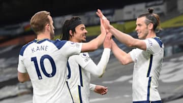 Tottenham Hotspur's Welsh midfielder Gareth Bale celebrates scoring his team's second goal with teammates during the English Premier League football match between Tottenham Hotspur and Sheffield United at Tottenham Hotspur Stadium in London, on May 2, 2021. - - RESTRICTED TO EDITORIAL USE. No use with unauthorized audio, video, data, fixture lists, club/league logos or 'live' services. Online in-match use limited to 120 images. An additional 40 images may be used in extra time. No video emulation. Social media in-match use limited to 120 images. An additional 40 images may be used in extra time. No use in betting publications, games or single club/league/player publications. (Photo by Shaun Botterill / POOL / AFP) / RESTRICTED TO EDITORIAL USE. No use with unauthorized audio, video, data, fixture lists, club/league logos or 'live' services. Online in-match use limited to 120 images. An additional 40 images may be used in extra time. No video emulation. Social media in-match use limited to 120 images. An additional 40 images may be used in extra time. No use in betting publications, games or single club/league/player publications. / RESTRICTED TO EDITORIAL USE. No use with unauthorized audio, video, data, fixture lists, club/league logos or 'live' services. Online in-match use limited to 120 images. An additional 40 images may be used in extra time. No video emulation. Social media in-match use limited to 120 images. An additional 40 images may be used in extra time. No use in betting publications, games or single club/league/player publications. (Photo by SHAUN BOTTERILL/POOL/AFP via Getty Images)