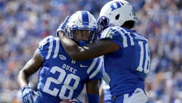 DURHAM, NC - OCTOBER 14: Mark Gilbert #28 of the Duke Blue Devils celebrates after making an interception with teammate Dylan Singleton #16 during their game against the Florida State Seminoles at Wallace Wade Stadium on October 14, 2017 in Durham, North Carolina. (Photo by Streeter Lecka/Getty Images)