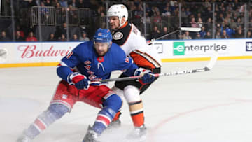 NEW YORK, NY - DECEMBER 19: Rick Nash #61 of the New York Rangers battles for the puck against Kevin Bieksa #3 of the Anaheim Ducks at Madison Square Garden on December 19, 2017 in New York City. (Photo by Jared Silber/NHLI via Getty Images)