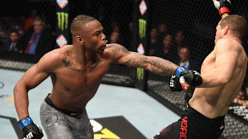 HOUSTON, TEXAS - FEBRUARY 08: (L-R) Khaos Williams punches Alex Morono in their welterweight bout during the UFC 247 event at Toyota Center on February 08, 2020 in Houston, Texas. (Photo by Josh Hedges/Zuffa LLC via Getty Images)