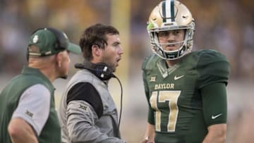 Sep 2, 2016; Waco, TX, USA; Baylor Bears offensive coordinator Kendal Briles talks to quarterback Seth Russell (17) as acting head coach Jim Grobe looks on during the first quarter of the game against the Northwestern State Demons at McLane Stadium. Mandatory Credit: Jerome Miron-USA TODAY Sports