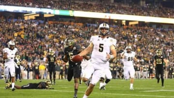 Jan 1, 2014; Glendale, AZ, USA; Central Florida Knights quarterback Blake Bortles runs into the end zone for a fourth quarter touchdown against the Baylor Bears during the Fiesta Bowl at University of Phoenix Stadium. Central Florida defeated Baylor 52-42. Mandatory Credit: Mark J. Rebilas-USA TODAY Sports