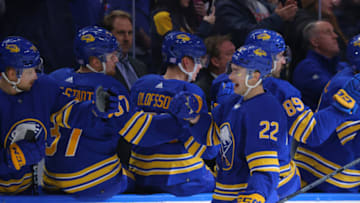 Nov 28, 2022; Buffalo, New York, USA; Buffalo Sabres right wing Jack Quinn (22) celebrates his goal with teammates during the first period against the Tampa Bay Lightning at KeyBank Center. Mandatory Credit: Timothy T. Ludwig-USA TODAY Sports