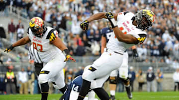 Nov 1, 2014; University Park, PA, USA; Maryland Terrapins linebacker Jesse Aniebonam (41) reacts to a sack on Penn State Nittany Lions quarterback Christian Hackenberg (14) during the first quarter at Beaver Stadium. Mandatory Credit: Rich Barnes-USA TODAY Sports