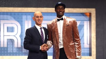 NEW YORK, NY - JUNE 21: Jaren Jackson Jr. poses with NBA Commissioner Adam Silver after being drafted fourth overall by the Memphis Grizzlies during the 2018 NBA Draft at the Barclays Center on June 21, 2018 in the Brooklyn borough of New York City. NOTE TO USER: User expressly acknowledges and agrees that, by downloading and or using this photograph, User is consenting to the terms and conditions of the Getty Images License Agreement. (Photo by Mike Stobe/Getty Images)