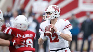 BLOOMINGTON, IN - NOVEMBER 04: Alex Hornibrook #12 of the Wisconsin Badgers looks to pass in the second quarter of a game against the Indiana Hoosiers at Memorial Stadium on November 4, 2017 in Bloomington, Indiana. (Photo by Joe Robbins/Getty Images)