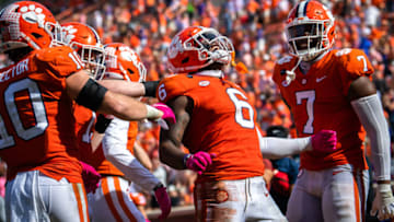 Oct 24, 2020; Clemson, South Carolina, USA; (Editors Notes: Caption Correction) Clemson linebacker Mike Jones Jr. (6) celebrates a touchdown in the second half against Syracuse at Memorial Stadium. Mandatory Credit: Ken Ruinard-USA TODAY Sports
