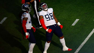 INGLEWOOD, CALIFORNIA - DECEMBER 18: Jeffery Simmons #98 of the Tennessee Titans celebrates after a tackle against the Los Angeles Chargers during the first quarter at SoFi Stadium on December 18, 2022 in Inglewood, California. (Photo by Ronald Martinez/Getty Images)